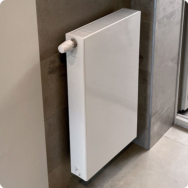 pose d un radiateur dans une salle de bain